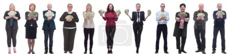 Photo for Group of successful people with money in their hands looking at the camera on a white background - Royalty Free Image