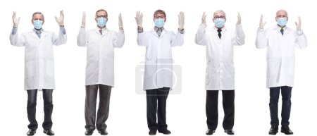 Téléchargez les photos : Group of doctors in mask isolated on white background - en image libre de droit