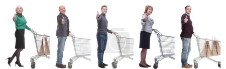 Photo for A group of people in profile with a basket showing thumbs up on a white background - Royalty Free Image