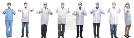Foto de Grupo de médicos en máscara aislados sobre fondo blanco - Imagen libre de derechos