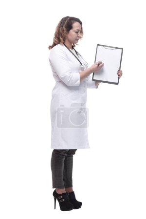 Photo for Young female doctor with clipboard. isolated on a white background. - Royalty Free Image