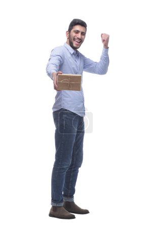 Photo for In full growth. happy man handing you a gift box. isolated on a white background. - Royalty Free Image