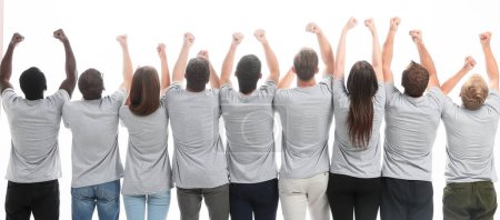 Foto de Vista trasera. un grupo de jóvenes de ideas afines levantando las manos. aislado en blanco - Imagen libre de derechos