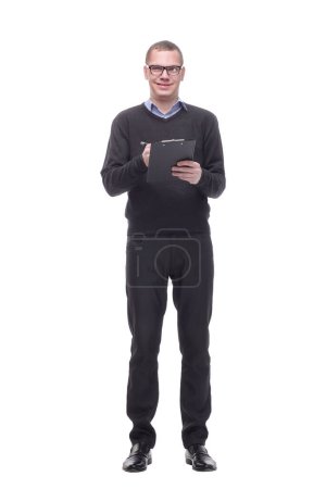 Photo for Attractive middle-aged man writing on clipboard. All on white background. - Royalty Free Image