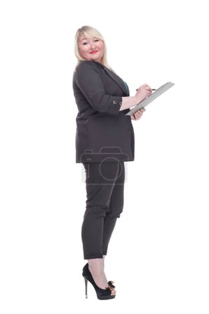 Photo for Side view. Mature woman making puts her signature in the clipboard . isolated on a white background. - Royalty Free Image