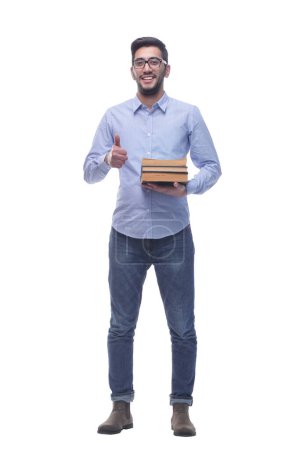 Photo for In full growth. young man with glasses and a stack of books. isolated on a white background. - Royalty Free Image