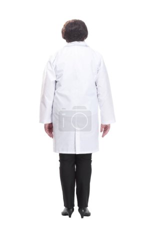 Photo for Rear view. senior female doctor with a stethoscope. isolated on a white background. - Royalty Free Image
