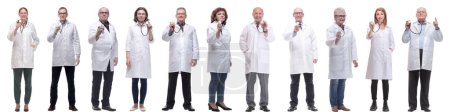 Photo for Group of doctors holding stethoscope isolated on white background - Royalty Free Image