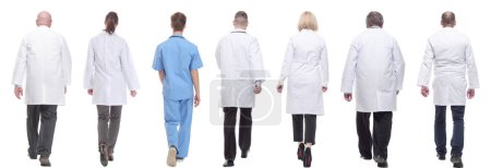 Téléchargez les photos : Groupe de médecins en mouvement isolé sur fond blanc - en image libre de droit