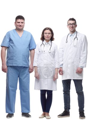 Foto de En pleno crecimiento.un grupo de colegas médicos de pie juntos. aislado sobre un fondo blanco. - Imagen libre de derechos