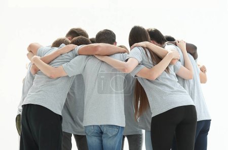 Photo for Group of young people standing in a circle and hugging each other. isolated on white - Royalty Free Image