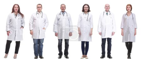 Photo for Group of doctors in full length isolated on white background - Royalty Free Image