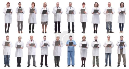 Téléchargez les photos : Full length group of doctors with notepad isolated on white background - en image libre de droit