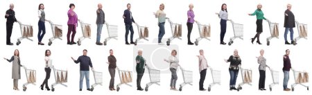 Photo for Group of people with shopping cart on white background - Royalty Free Image