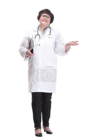 in full growth. senior female doctor with clipboard. isolated on a white background.