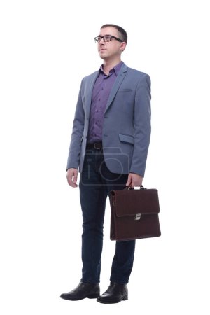 Photo for Full-length portrait of businessman handing briefcase, isolated on white. Concept of business and success - Royalty Free Image