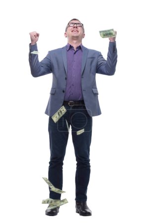 Photo for Happy young man in formalwear standing isolated on white while money falling at him. Concept of business successful - Royalty Free Image