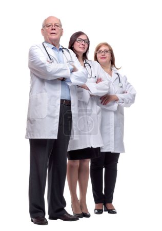 Foto de En pleno crecimiento. diversos profesionales médicos de pie juntos. aislado en un blanco - Imagen libre de derechos