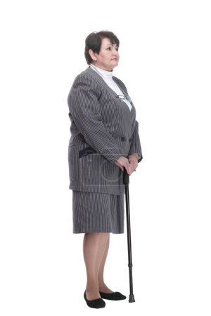 Foto de En pleno crecimiento. anciana segura de sí misma con un bastón. aislado sobre un fondo blanco. - Imagen libre de derechos