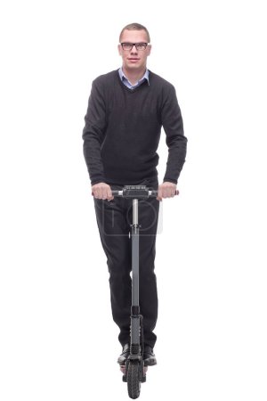 Photo for Full length portrait of a cheerful cool man with a scooter gesturing ok with his hand isolated on white background - Royalty Free Image