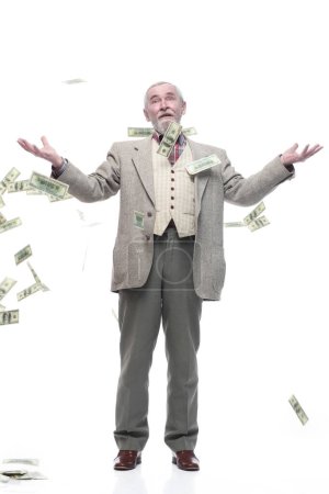 Foto de En pleno crecimiento. anciano hombre de negocios con billetes. aislado sobre un fondo blanco. - Imagen libre de derechos