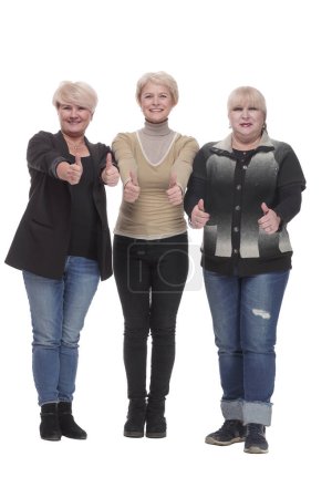 Foto de En pleno crecimiento. tres mujeres felices de pie juntas. aislado sobre un fondo blanco. - Imagen libre de derechos