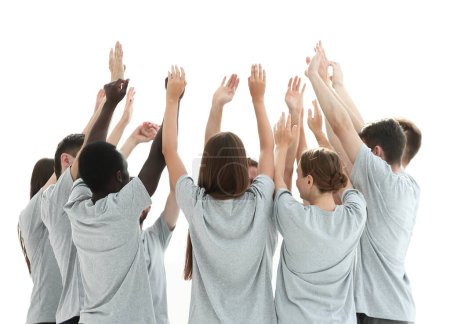 Téléchargez les photos : En pleine croissance. groupe de jeunes debout dans un cercle avec les mains en l'air. photo avec espace de copie - en image libre de droit