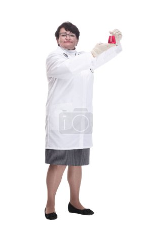Photo for In full growth. senior female medic with a laboratory flask. isolated on a white background. - Royalty Free Image