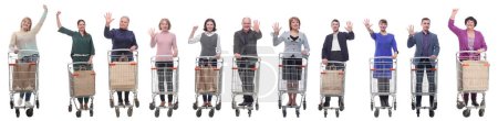 Photo for Group of people with shopping cart showing thumbs up at camera isolated on white background - Royalty Free Image