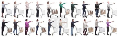 Photo for A group of people with a shopping cart point their fingers in front of them on a white background - Royalty Free Image