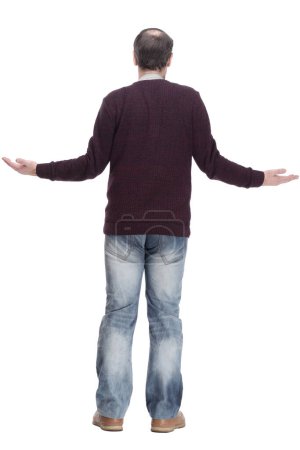 Foto de Vista trasera. un hombre casual en jeans y un jersey. aislado sobre un fondo blanco. - Imagen libre de derechos