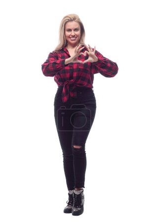 Photo for Full-length.casual young woman in a red checked shirt and tight pants. isolated on a white background. - Royalty Free Image