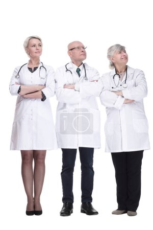 Photo for In full growth. experienced doctors colleagues standing together. isolated on a white background. - Royalty Free Image