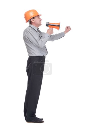 Photo for Side view. senior architect making an announcement via megaphone . isolated on a white background. - Royalty Free Image