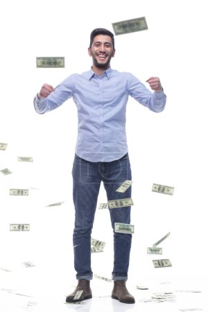 Photo for In full growth. cheerful man with banknotes . isolated on a white background. - Royalty Free Image