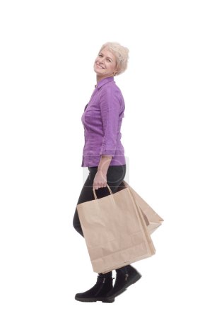 Photo for In full growth. smiling casual woman with shopping bags. isolated on a white background. - Royalty Free Image