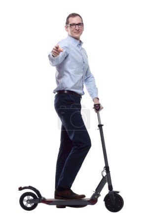 Photo for Side view. casual man with electric scooter looking at you. isolated on a white - Royalty Free Image
