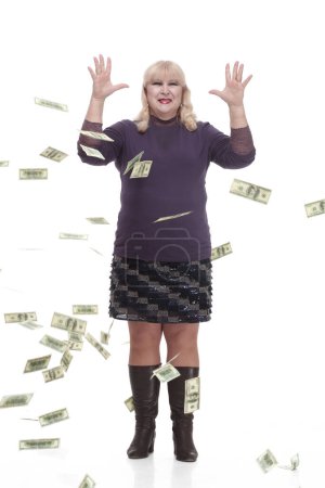 Photo for Full-length.casual mature woman with banknotes . isolated on a white background. - Royalty Free Image