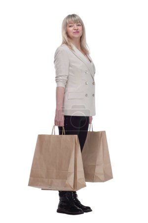 Photo for In full growth. smiling blonde woman with shopping bags . isolated on a white background. - Royalty Free Image