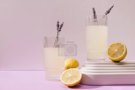 Two ribbed glasses with lavender lemonade, summer refreshing drink