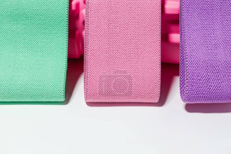 Photo for Colorful resistance fitness bands close-up. Workout at home - Royalty Free Image