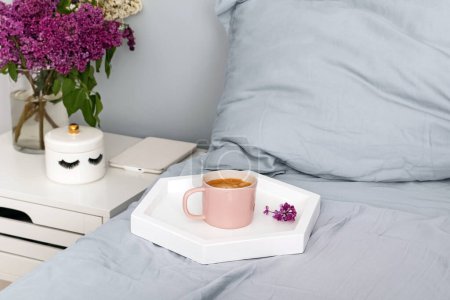 Photo for Tray with coffee on the bed, cozy morning - Royalty Free Image