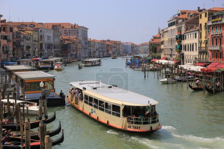 Photo for Venice, Italy - 21 July, 2019: Panorama city and canal with boats in Venice - Royalty Free Image