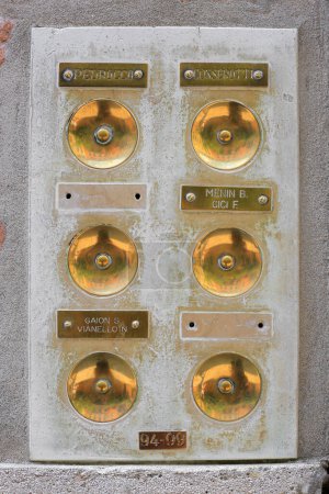 Photo for Venice, Italy - 21 July, 2019:  Vintage golden doorbells close-up in Venice - Royalty Free Image