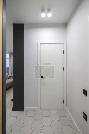 Photo for White interiors door inside an apartment in a modern interior - Royalty Free Image