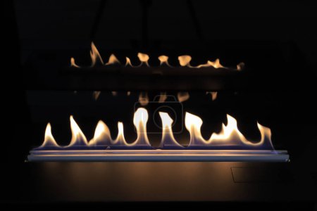 Burning modern eco bio ethanol fireplace close-up