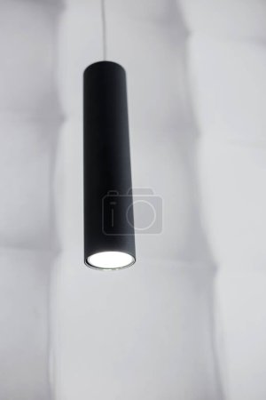 Photo for Modern hanging black led lamp close-up from the ceiling - Royalty Free Image