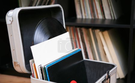 Foto de Vinyl record collection for turntable. DJ travel case with set of classic records - Imagen libre de derechos