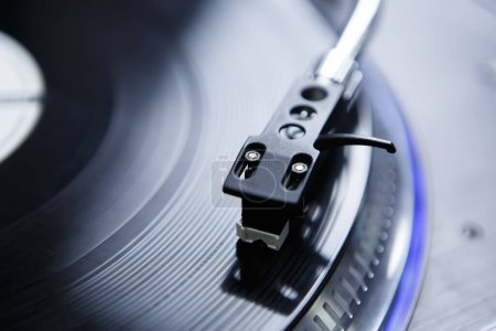 Photo for Turntables needle on vinyl record. Tone arm with professional spherical needle on turn table player - Royalty Free Image
