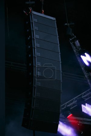 Foto de Concert speaker massive mounted on electronic music stage. Big black speakers for summer festival - Imagen libre de derechos
